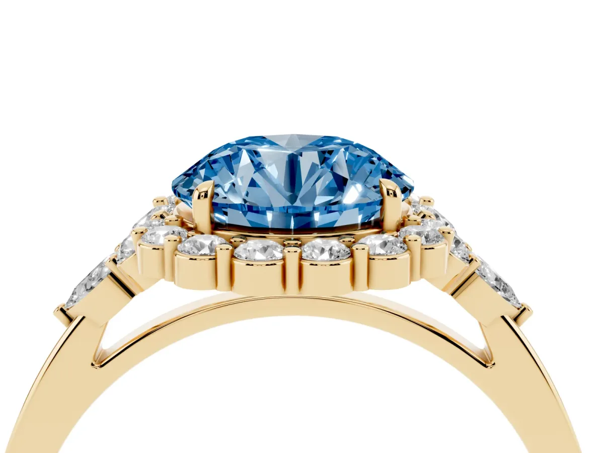 Fancy Blue Round Cut Diamond Halo Ring with Pear Side Stones and Prong Setting Yellow gold