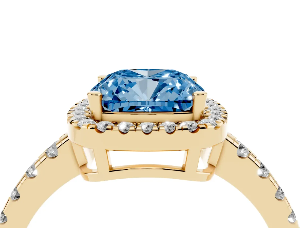 Fancy Blue Cushion Cut Diamond Halo Ring with Pavé Band and Four-Prong Setting Yellow gold