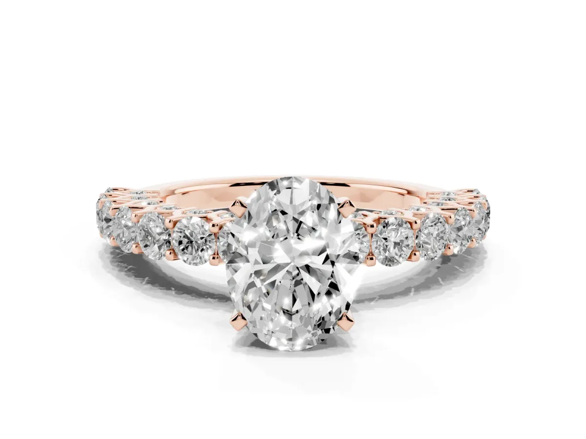 Oval Cut Diamond Solitaire Ring with Shared Prong Pavé Band and Four-Prong Setting Rose gold