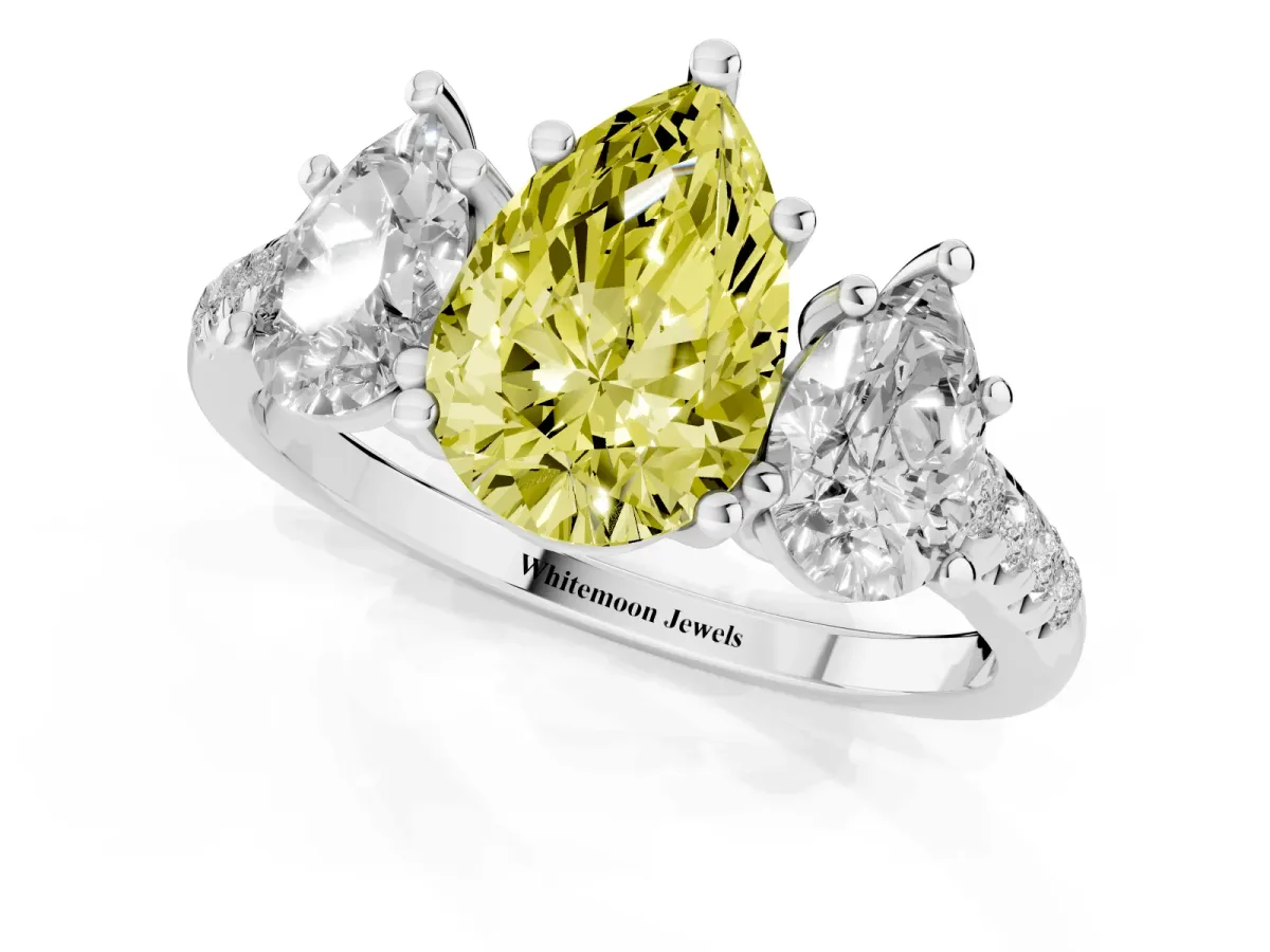 Fancy Yellow Three-Stone Pear Cut Diamond Ring with Round Pavé Band and Prong Setting Silver