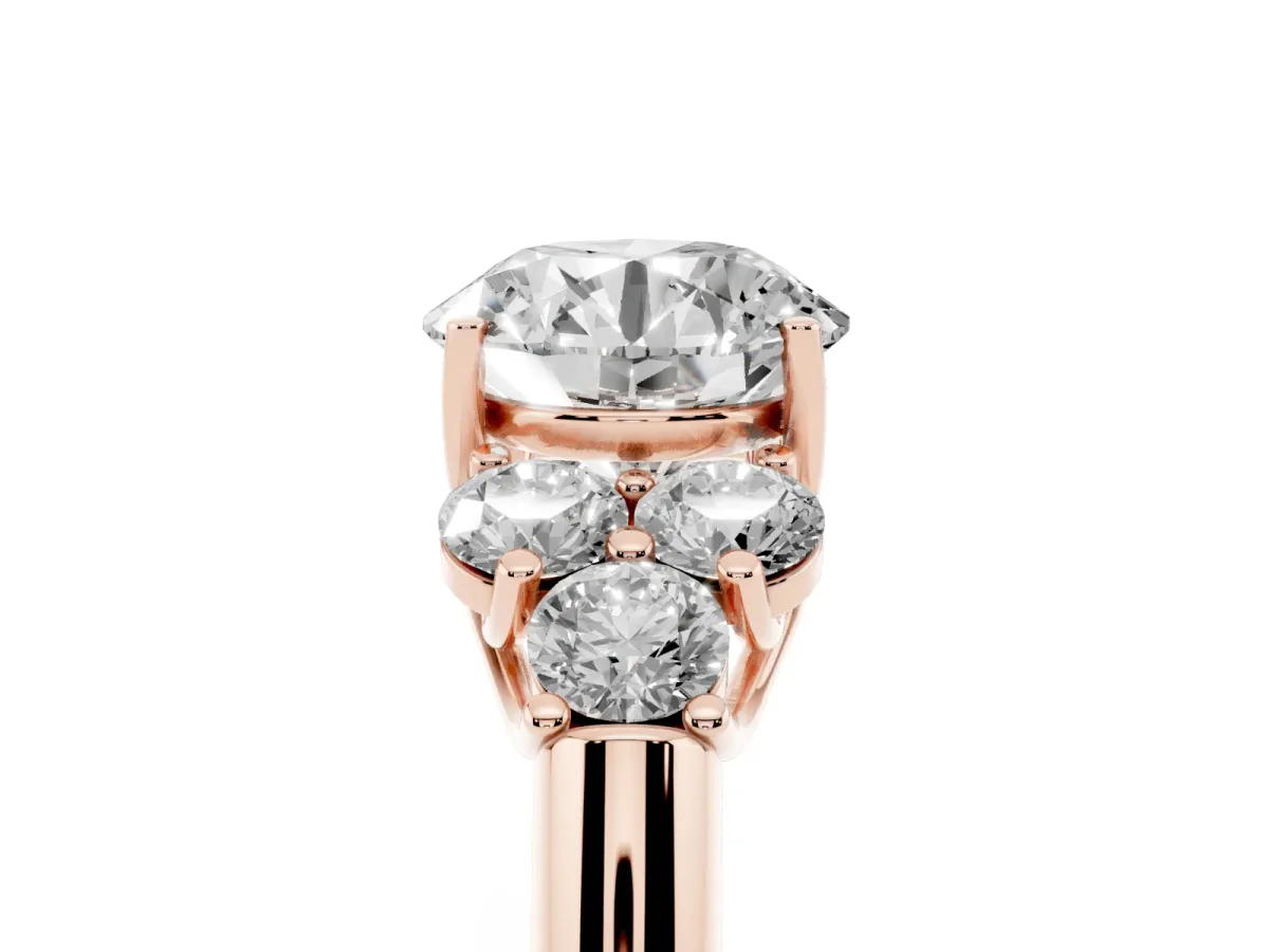 Round Cut Cut Diamond Cluster Ring with Round Accent Stones and Prong Setting on a Classic Band Rose gold