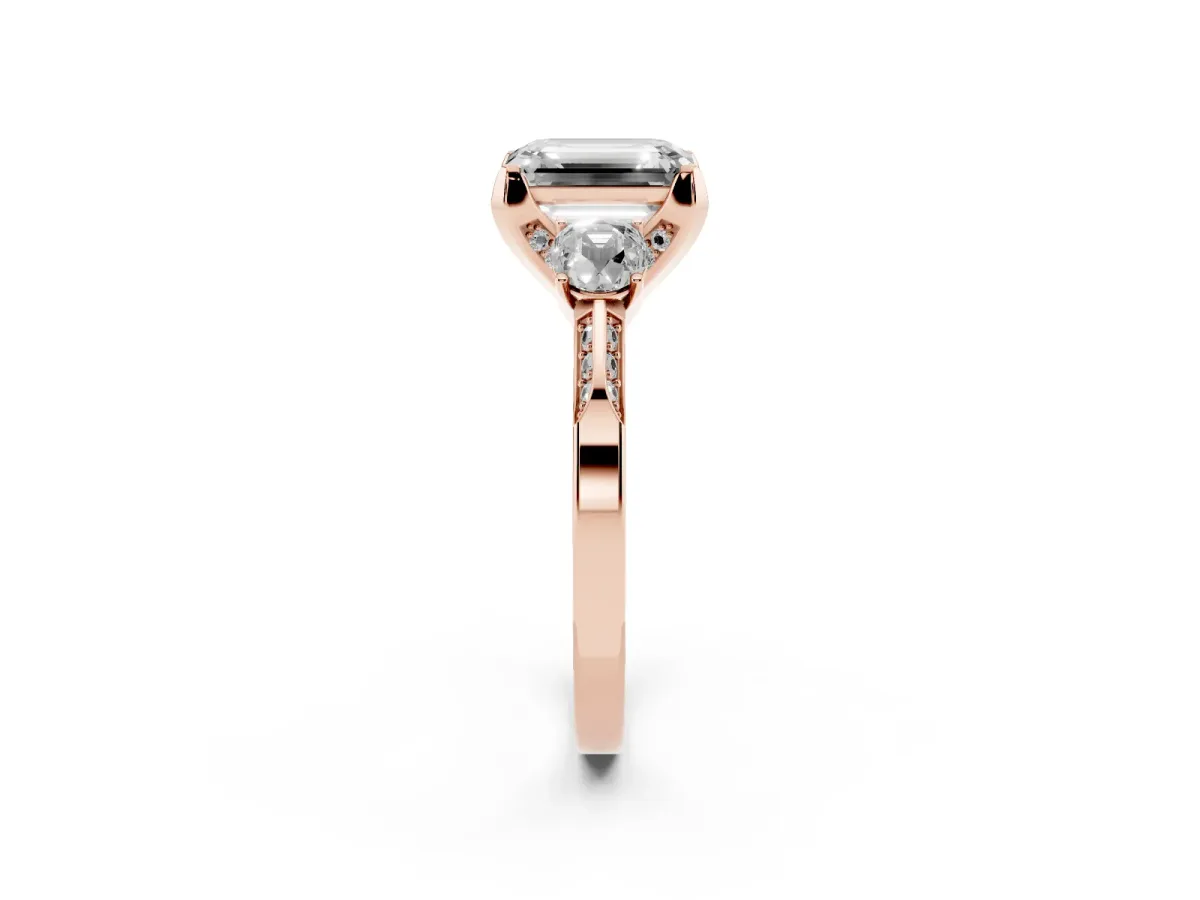 Emerald Cut Brilliant Three-Stone Diamond Ring with Pavé Band and Four-Prong Setting Rose gold