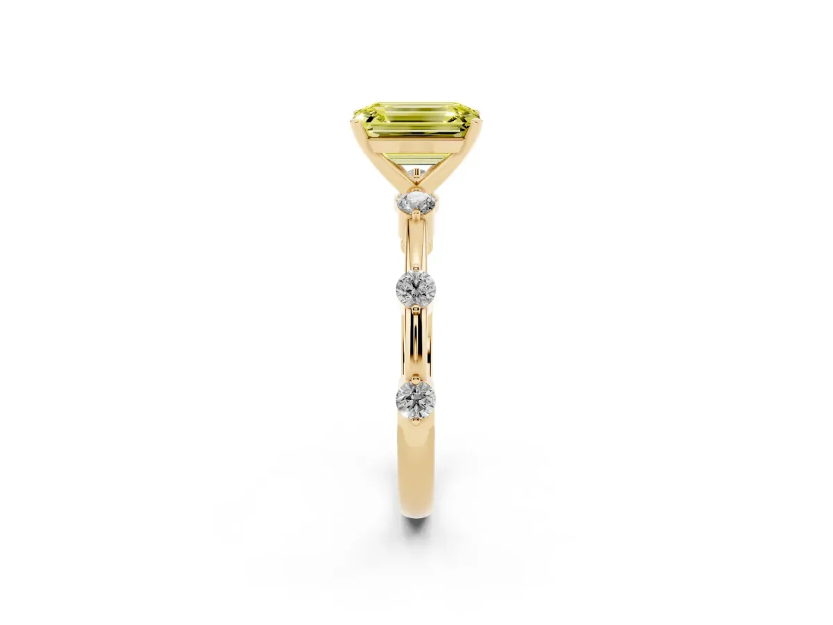 Fancy Yellow Emerald Cut Solitaire Diamond Ring with Bezel Set Side Stones and Prong Setting Yellow gold