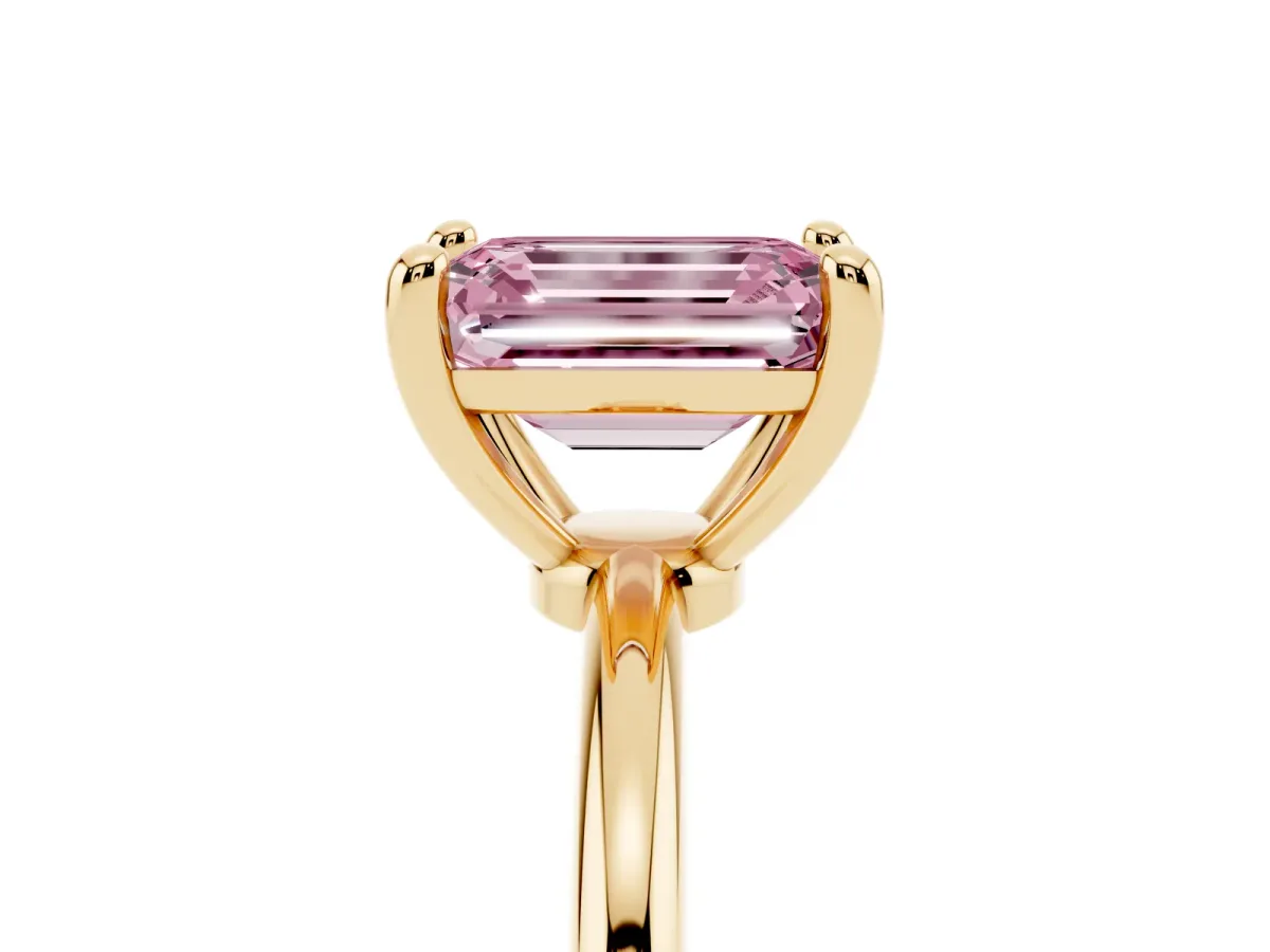 Fancy Pink Emerald Cut Solitaire Diamond Ring with 4-Prong Setting on a Classic Band Yellow gold