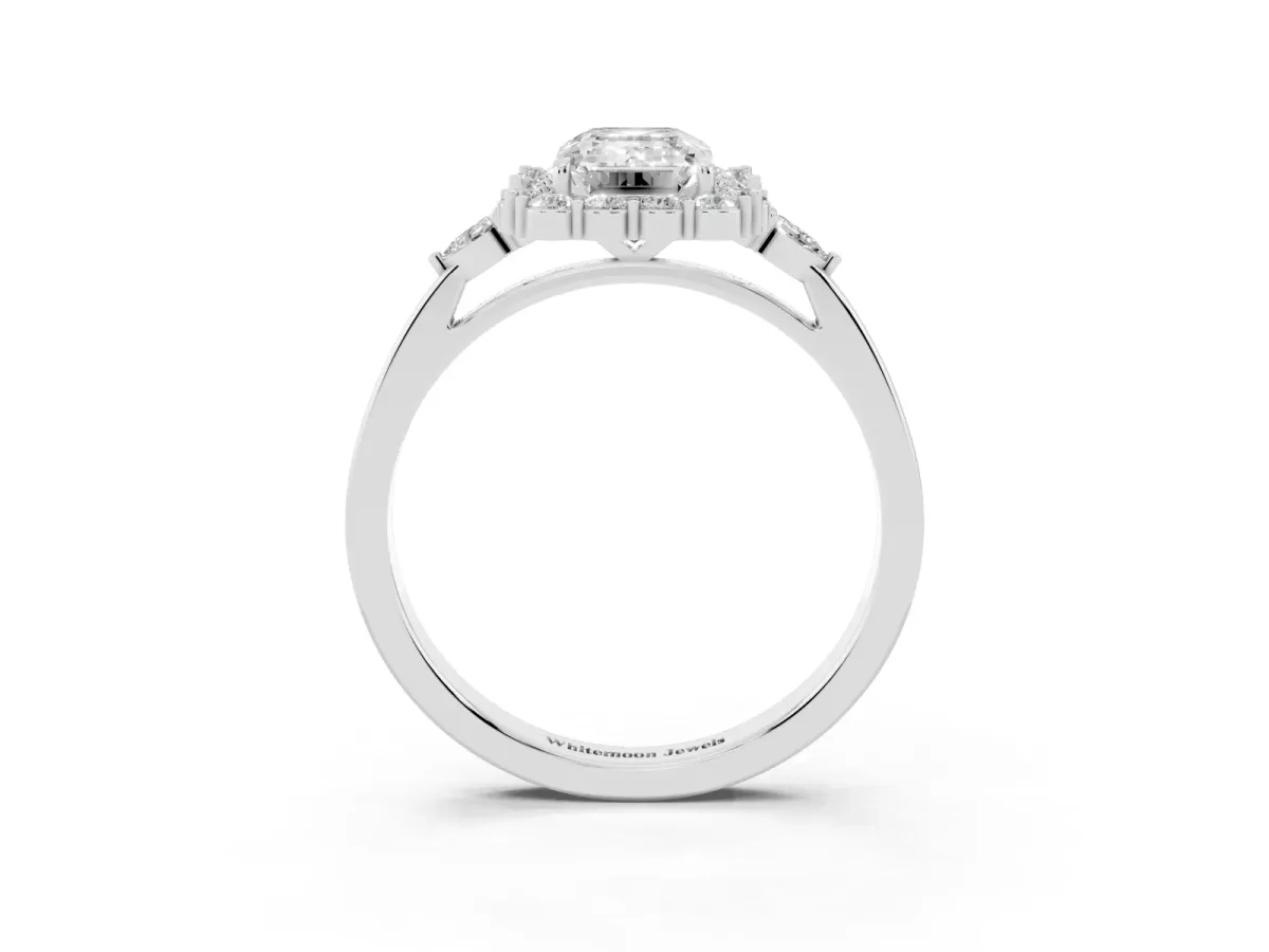 Emerald Cut Diamond Halo Ring with Pear Side Stones and Prong Setting Platinum