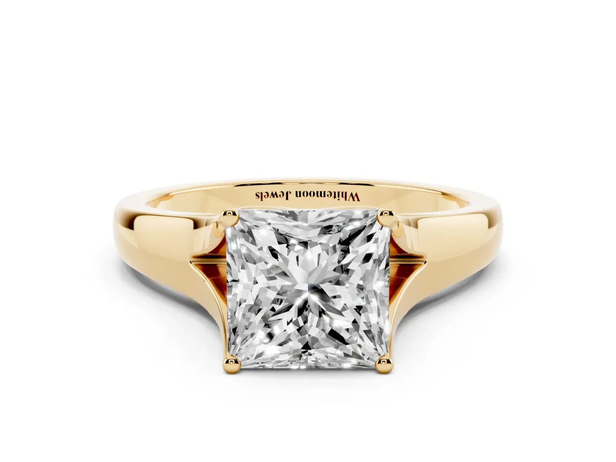 Princess Cut Solitaire Diamond Ring with Cathedral Band and Four-Prong Setting Yellow gold