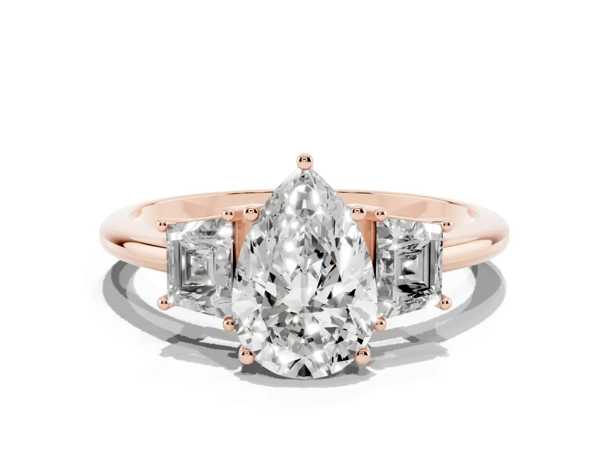 Pear Cut Diamond Three-Stone Ring with Trapezoid Side Stones and Prong Setting Rose gold