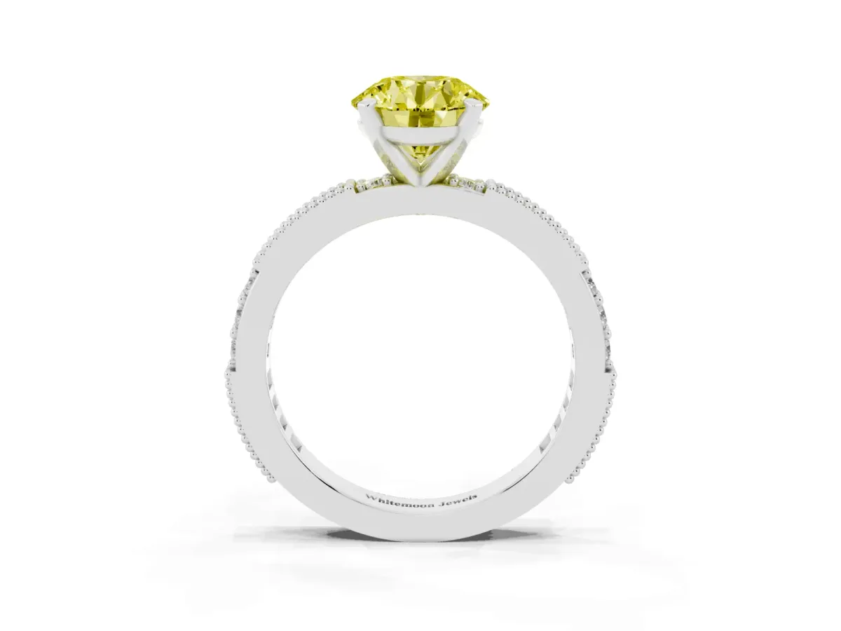 Fancy Yellow Round Cut Solitaire with Pavé Band and Four-Prong Setting Platinum