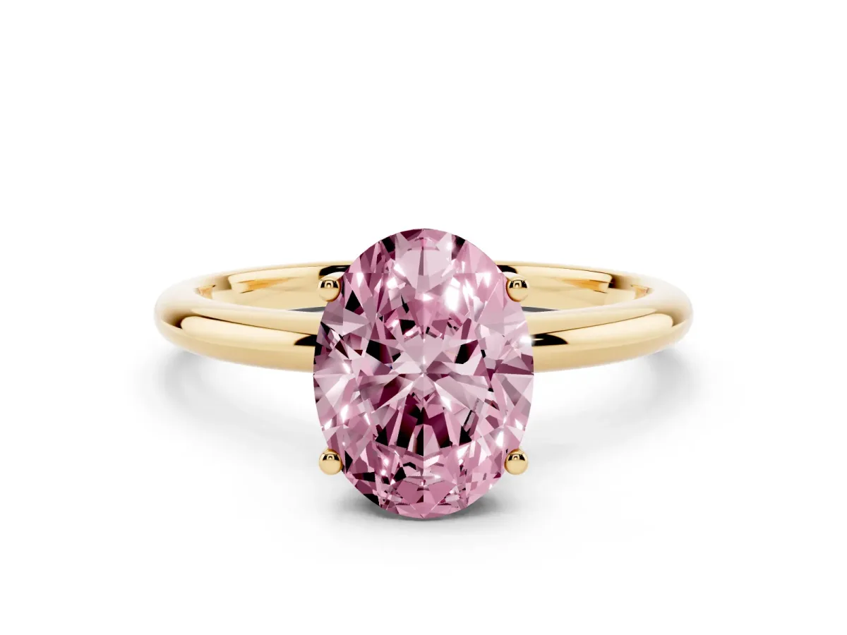 Fancy Pink Oval Cut Cut Solitaire Engagement Ring with Four-Prong Setting and Classic Band Yellow gold