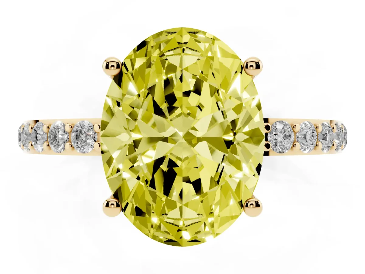 Fancy Yellow Oval Cut Diamond Solitaire Ring with Round Pavé Shoulders and Prong Setting Yellow gold