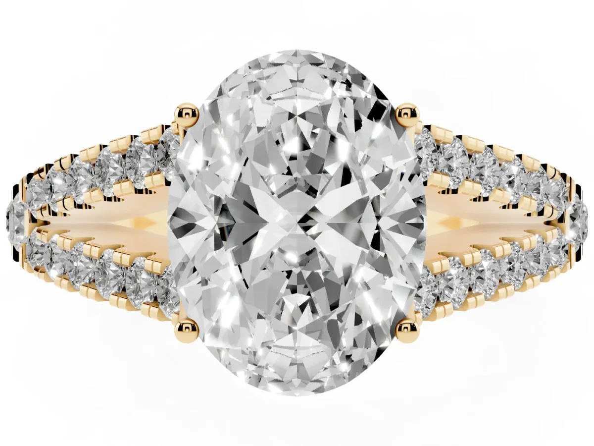 Oval Cut Diamond Split Shank Pavé Engagement Ring with Four-Prong Setting Yellow gold