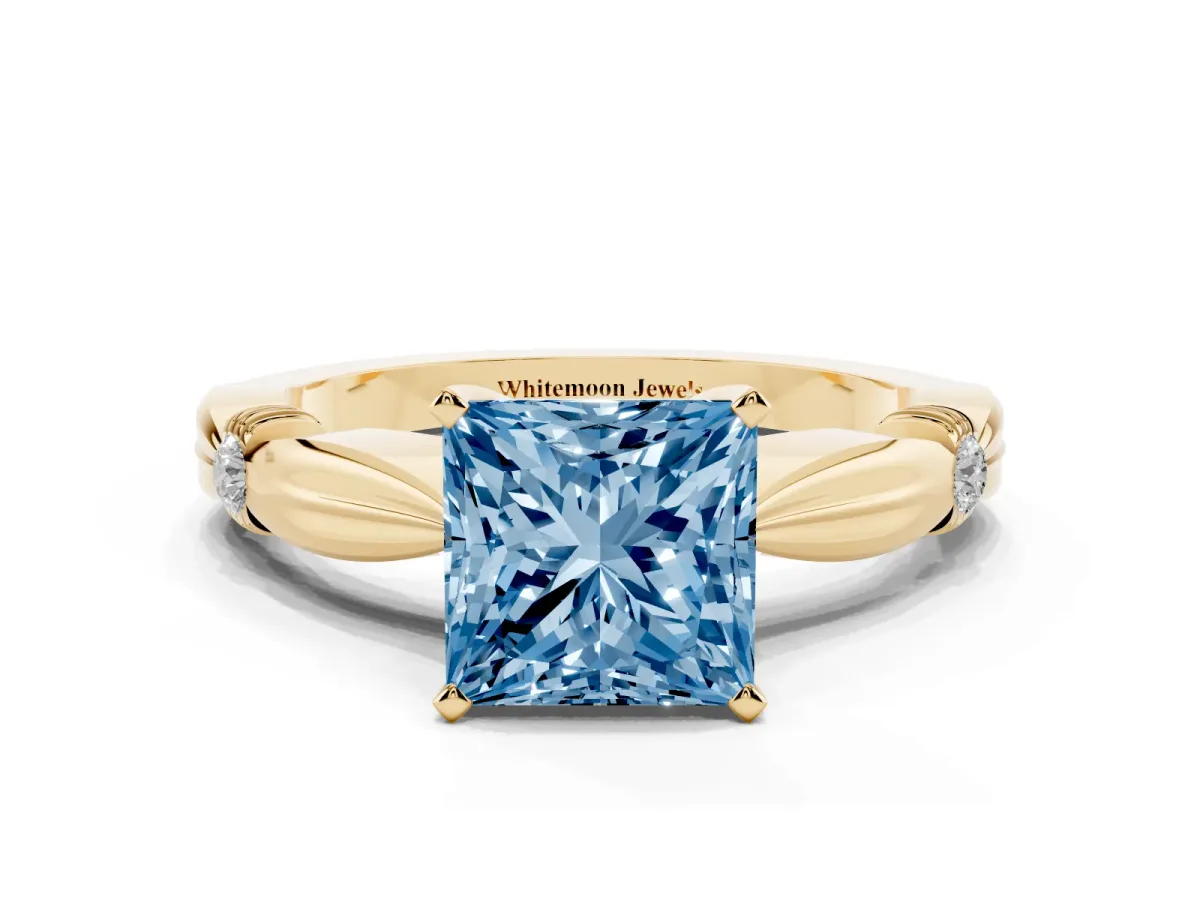 Fancy Blue Princess Cut Solitaire Diamond Twisted Band with Four-Prong Setting Yellow gold