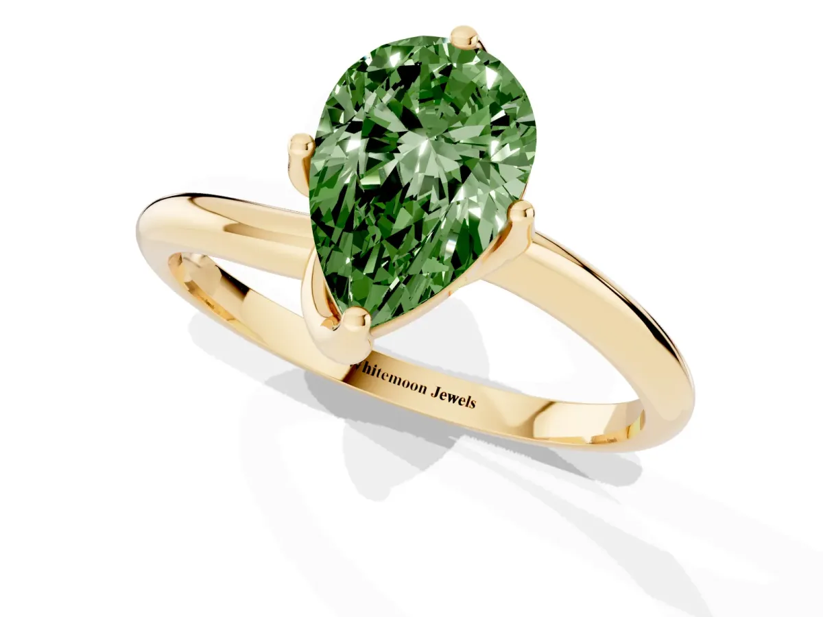 Fancy Green Pear Cut Diamond Solitaire Engagement Ring with Four-Prong Setting and Classic Band Yellow gold