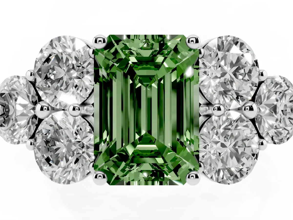 Fancy Green Emerald Cut Cut Diamond Cluster Ring with Round Accent Stones and Prong Setting on a Classic Band White gold