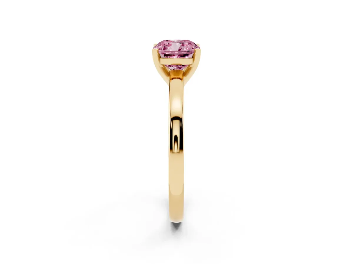 Fancy Pink Cushion Cut Solitaire Diamond Engagement Ring with Four-Prong Setting on a Classic Band Yellow gold