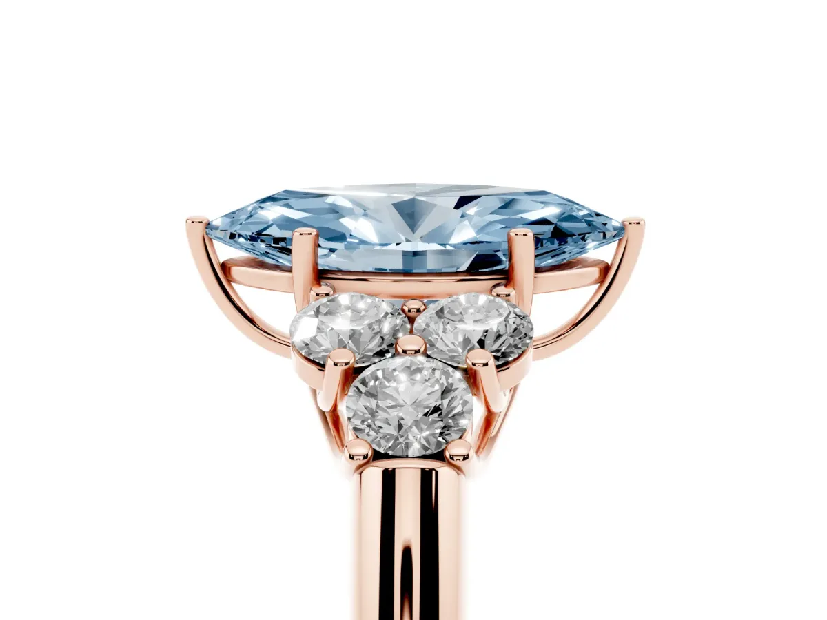 Fancy Blue Marquise Cut Cut Diamond Cluster Ring with Round Accent Stones and Prong Setting on a Classic Band Rose gold