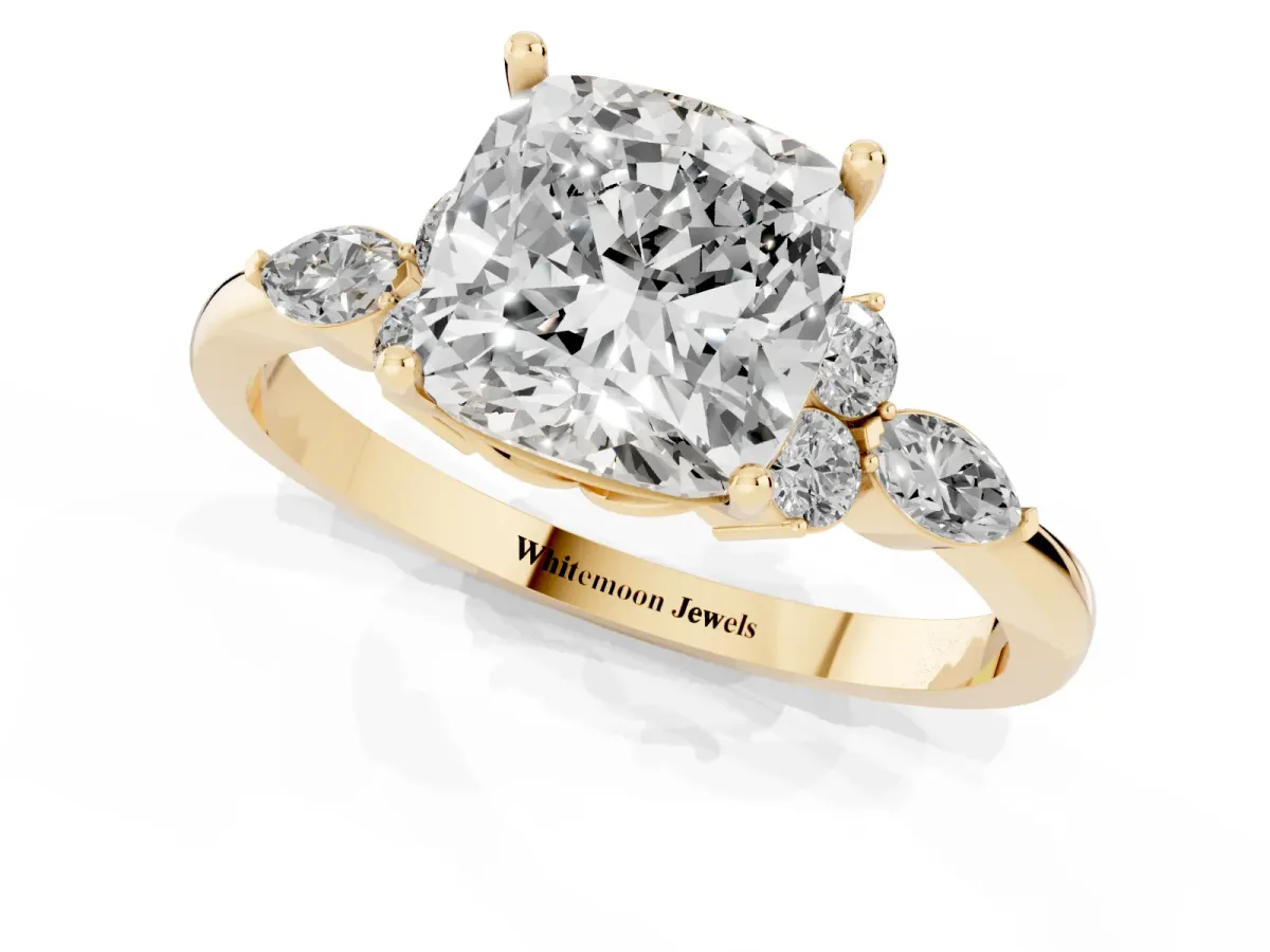 Cushion Cut Brilliant Diamond Solitaire Ring with Pear Side Stones and Four-Prong Setting Yellow gold