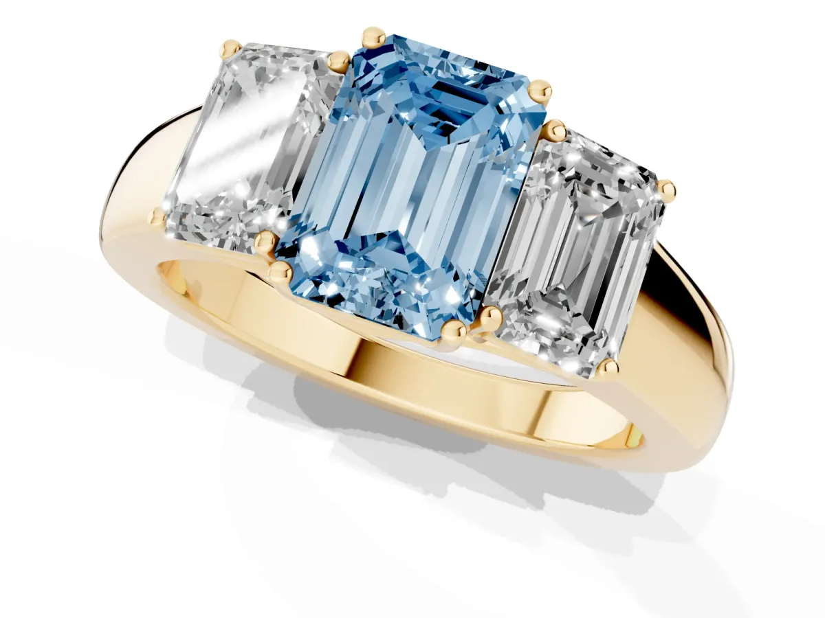 Fancy Blue Three-Stone Emerald Cut Cut Diamond Ring with Prong Setting and Classic Band Yellow gold