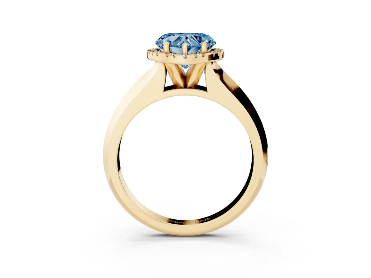 Fancy Blue Heart Cut Halo Diamond Ring with Cathedral Band and Four-Prong Setting Yellow gold