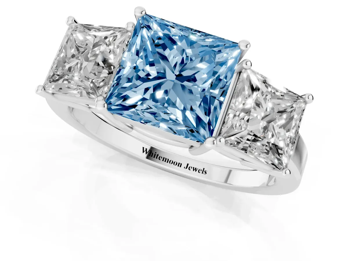 Fancy Blue Three-Stone Princess Cut Cut Diamond Engagement Ring with Flat Band and Four-Prong Setting Silver