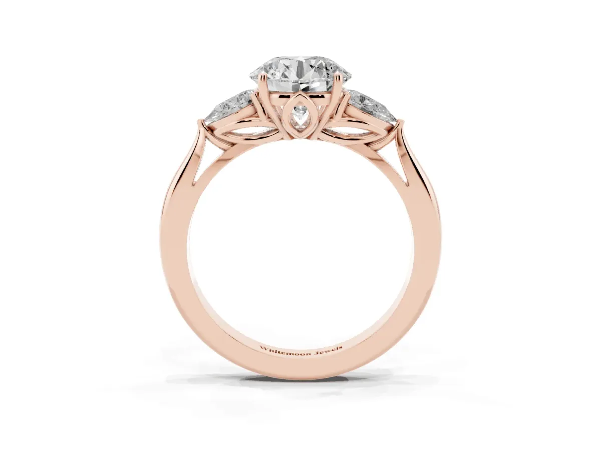 Three-Stone Round Cut Diamond Ring with Pear Side Stones in Four-Prong Setting Rose gold