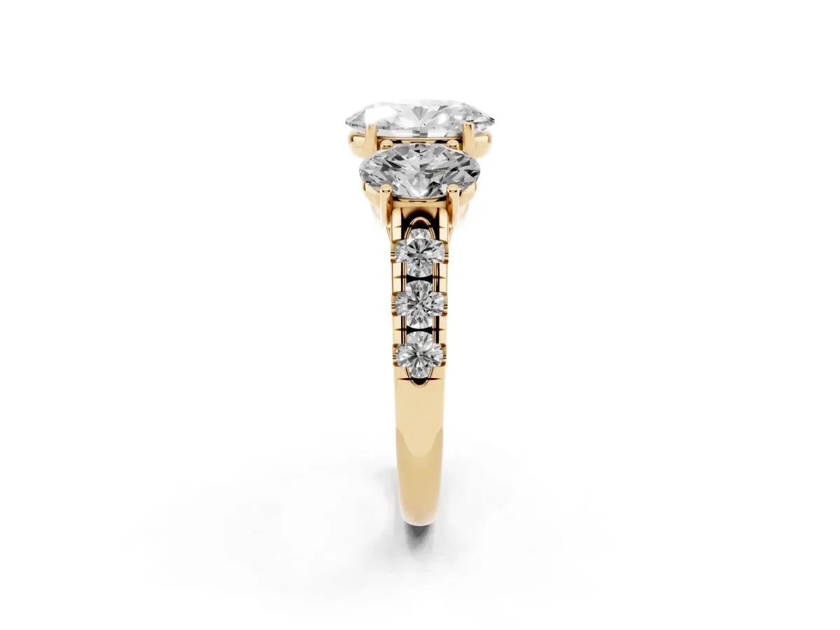 Three-Stone Oval Cut Diamond Pavé Band with Prong Setting Yellow gold