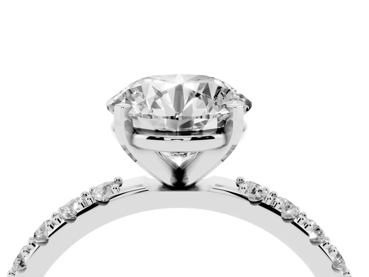 Round Cut Diamond Solitaire Pavé Band with Four-Prong Setting Silver