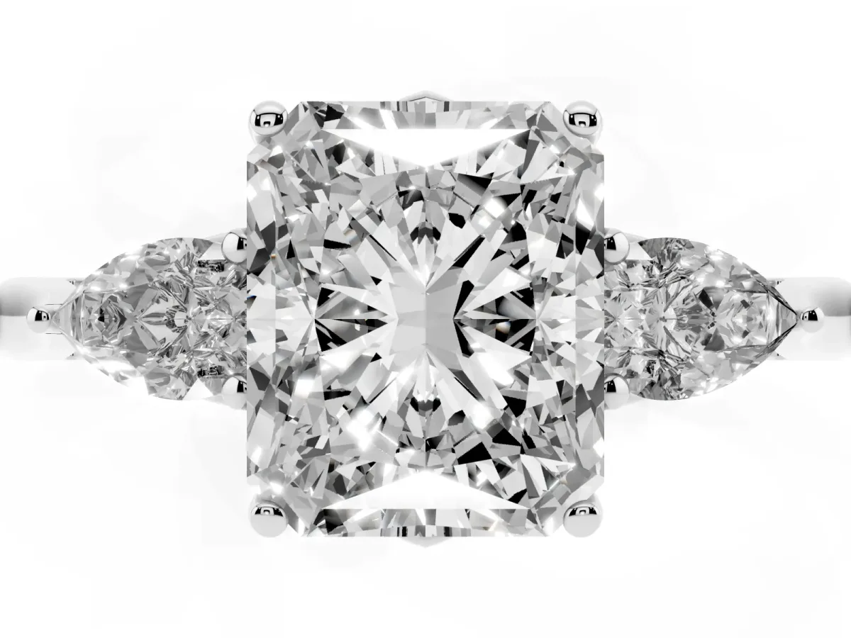 Three-Stone Radiant Cut Brilliant Diamond Solitaire Ring with Tapered Band and Four-Prong Setting Platinum