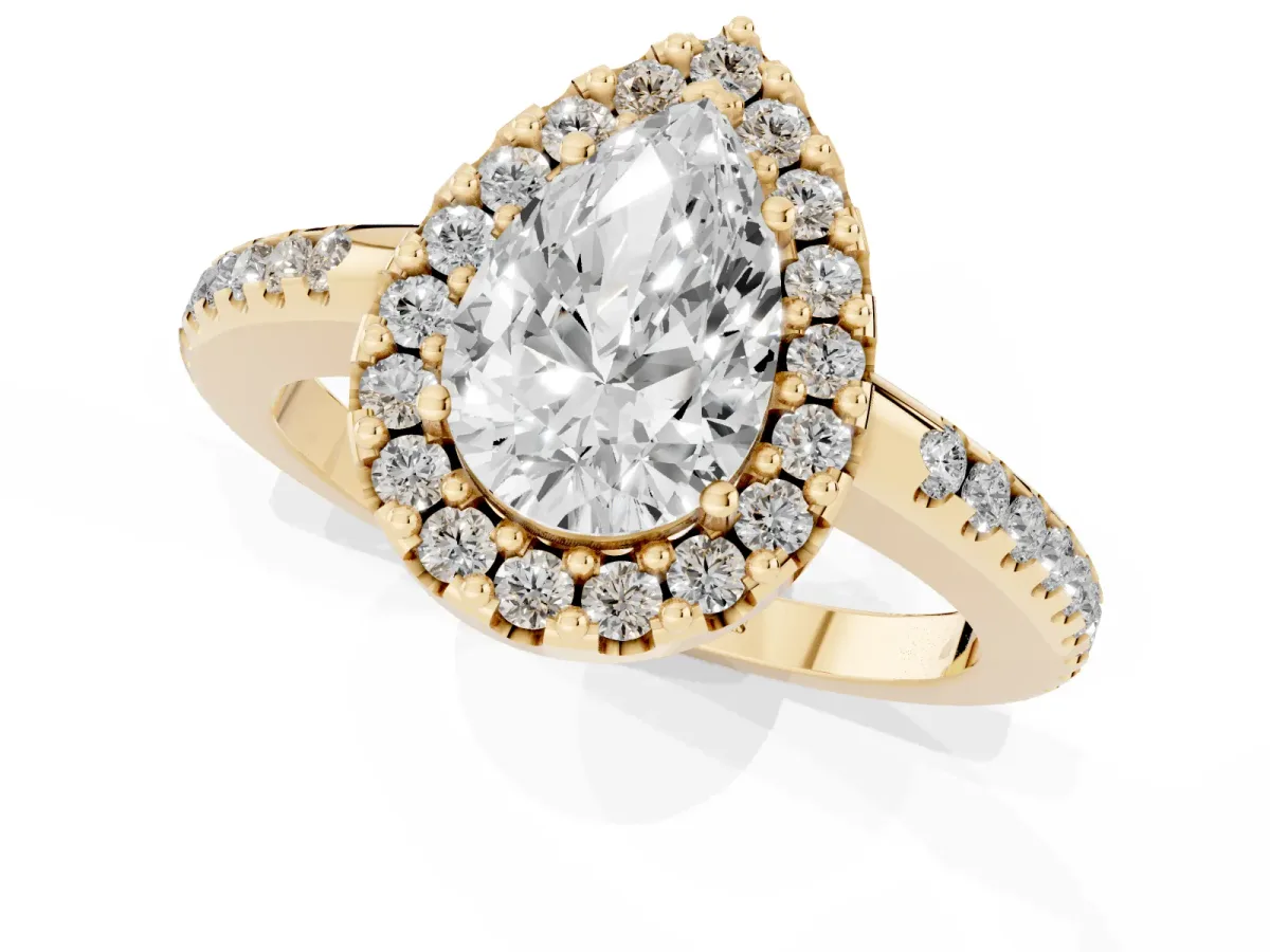 Pear Cut Diamond Pavé Halo Ring with Four-Prong Setting Yellow gold