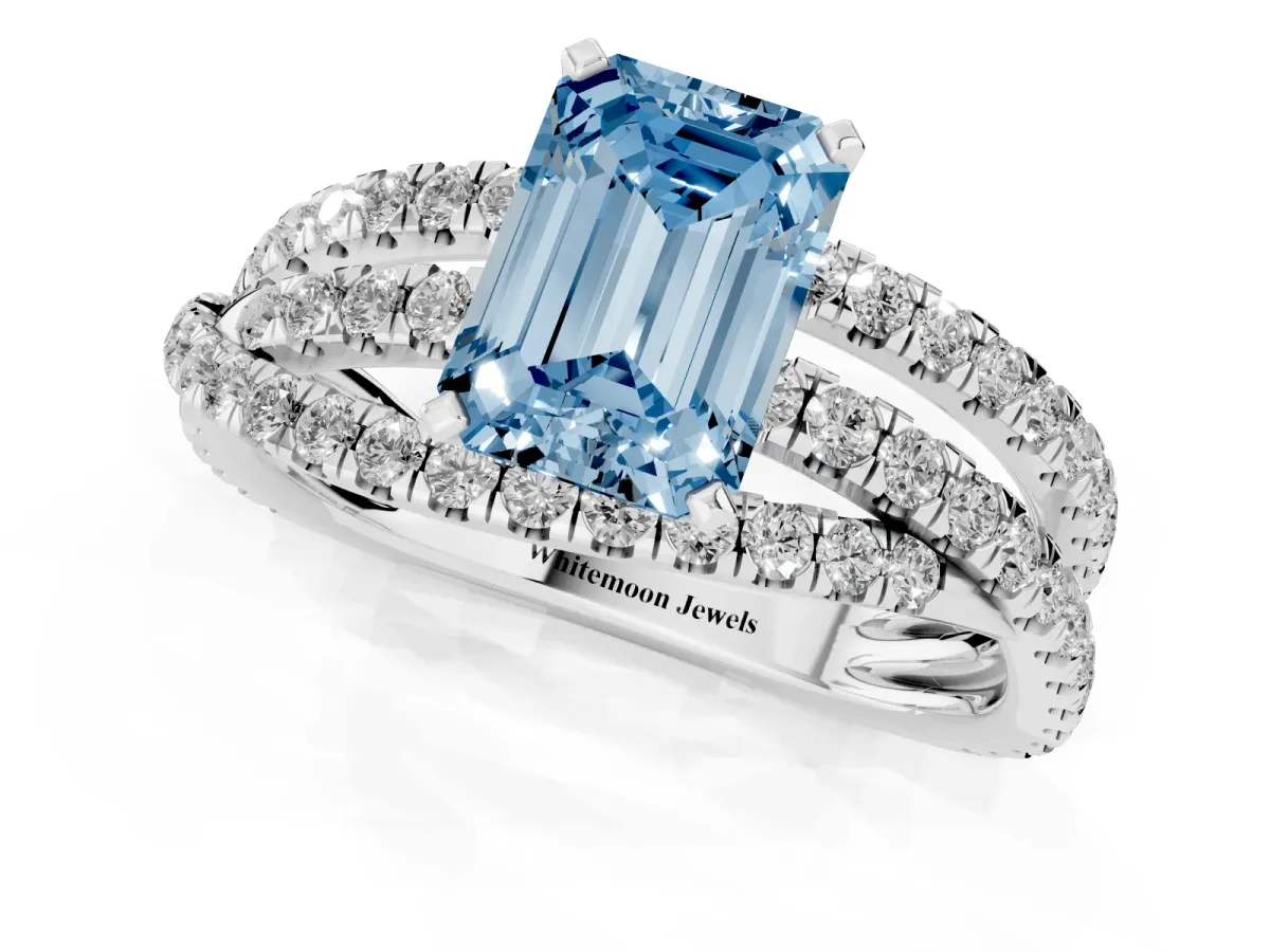 Fancy Blue Emerald Cut Solitaire Twist Band with Pavé Setting and Four-Prong Setting Silver
