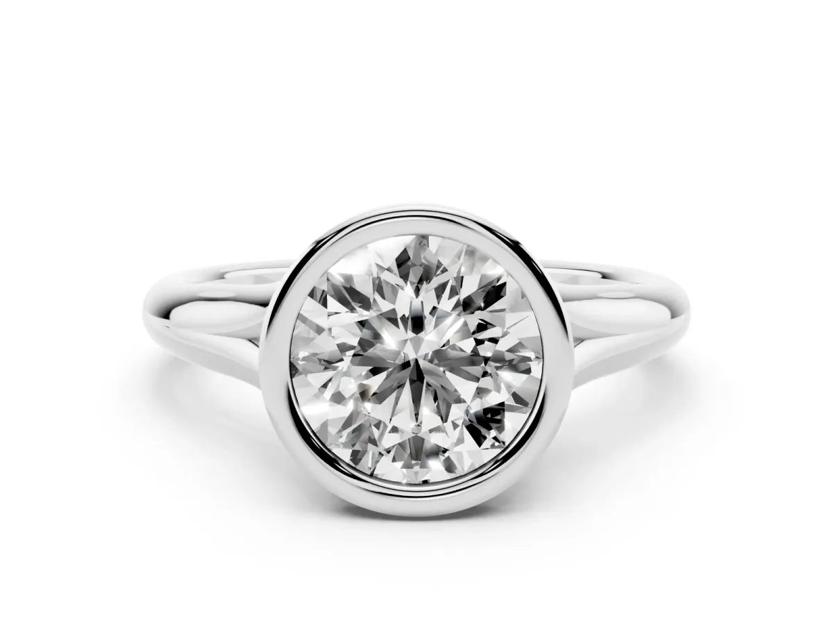 Bezel Set Round Cut Solitaire Diamond Ring with Smooth Band Platinum