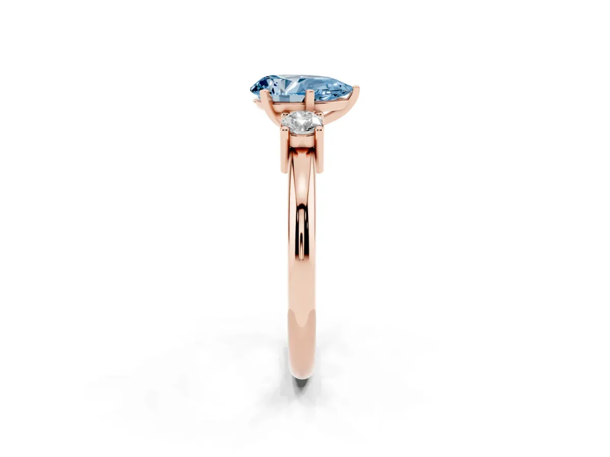 Fancy Blue Three-Stone Pear Cut Cut Diamond Solitaire with Prong Setting and Classic Band Rose gold