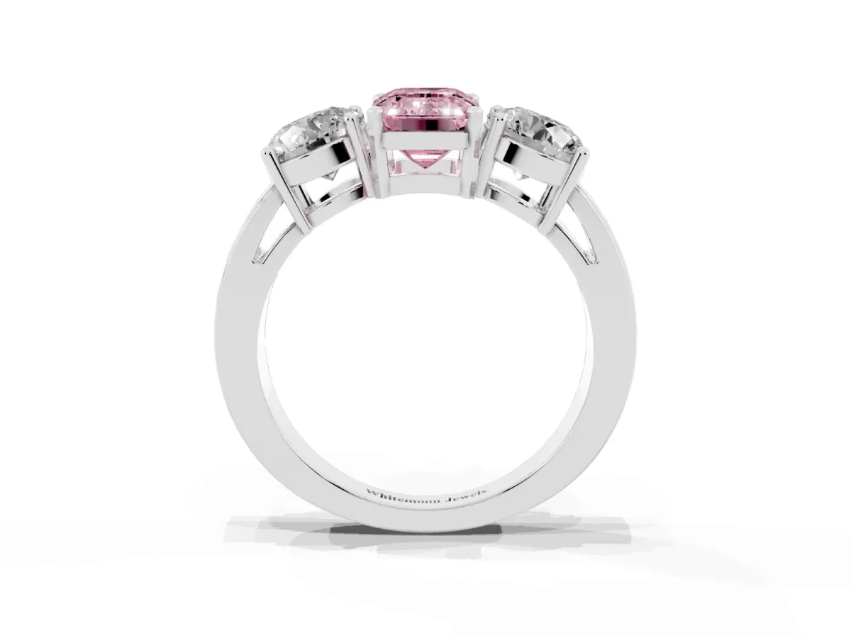 Fancy Pink Three-Stone Emerald Cut Diamond Ring with Round Side Stones, Classic Band, and Four-Prong Setting Silver