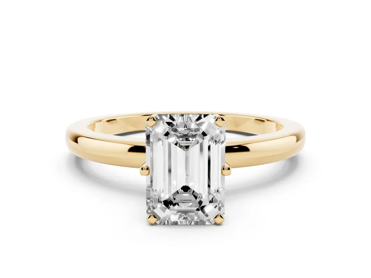 Emerald Cut Solitaire Diamond Ring with Six-Prong Setting on a Classic Band Yellow gold