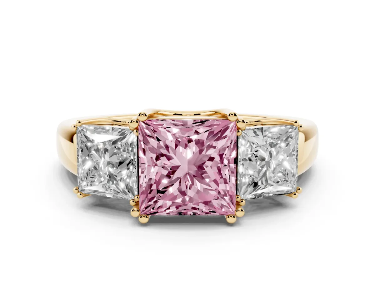 Fancy Pink Three-Stone Princess Cut Cut Diamond Ring with Channel Set Band and Four-Prong Setting Yellow gold