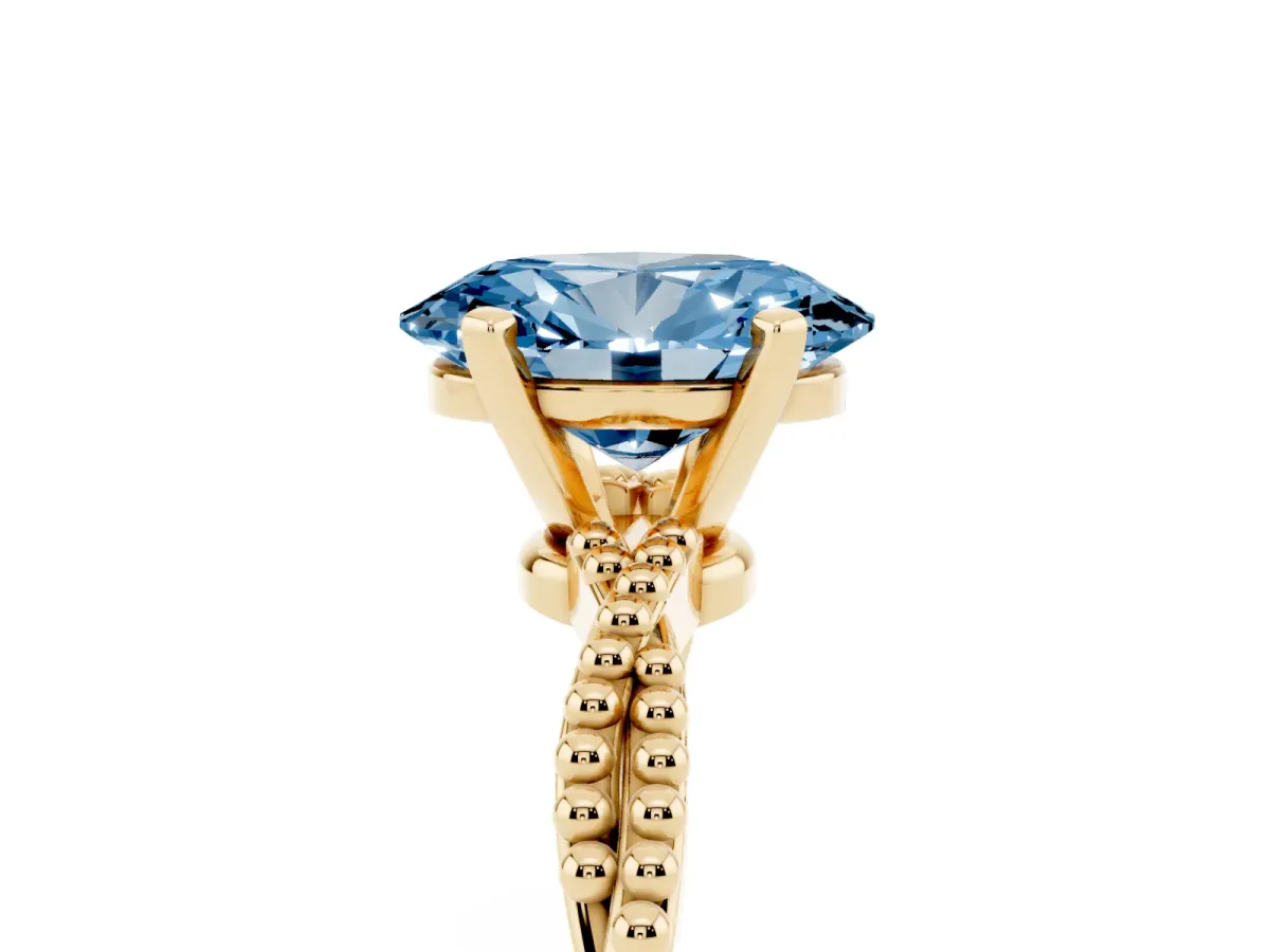 Fancy Blue Oval Cut Solitaire Twisted Band with Bead Prong Setting Yellow gold
