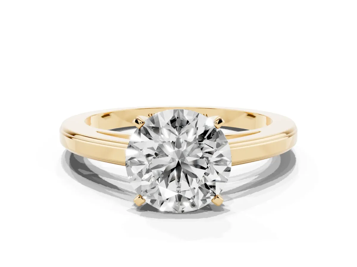 Round Cut Solitaire Diamond Ring with Four-Prong Setting and Classic Band Yellow gold