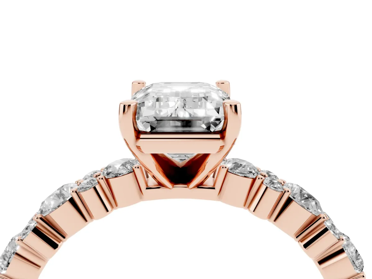Emerald Cut Diamond Side Stone Solitaire Ring with Round and Four-Prong Setting Rose gold