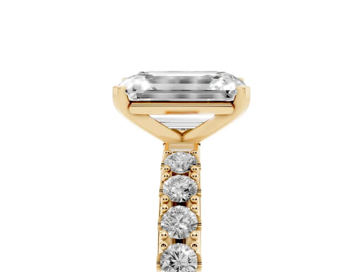 Emerald Cut Diamond Solitaire Pavé Band with Four-Prong Setting Yellow gold