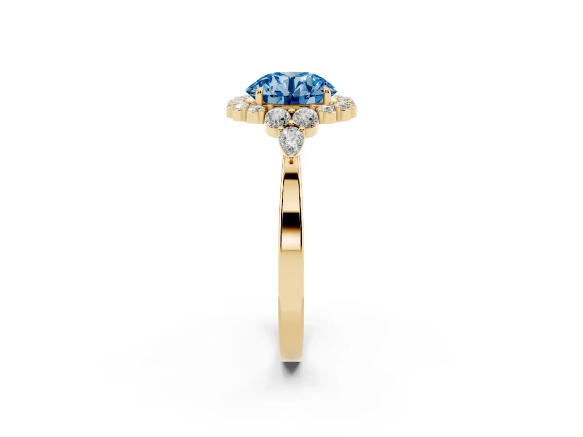 Fancy Blue Round Cut Diamond Halo Ring with Pear Side Stones and Prong Setting Yellow gold