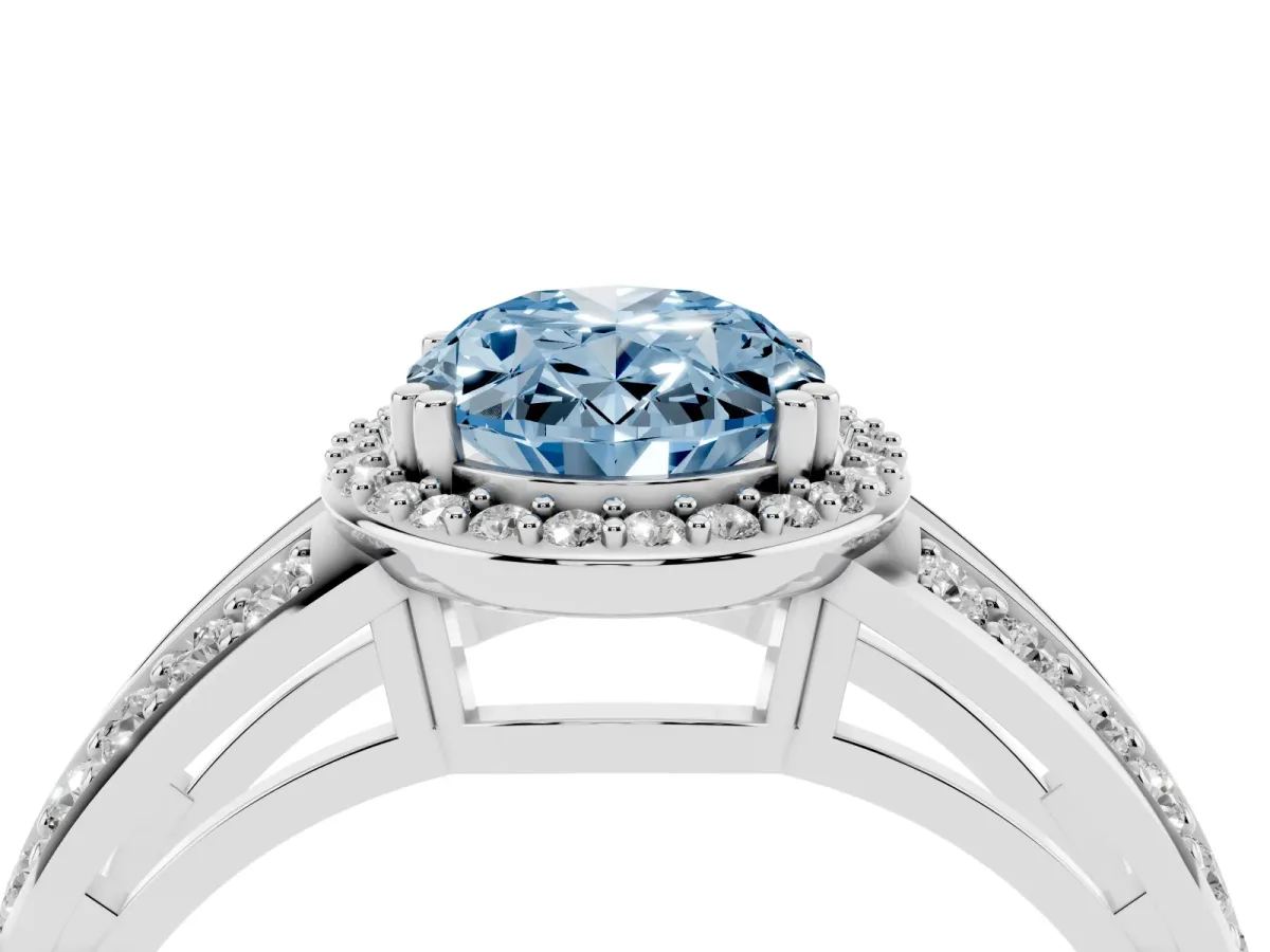Fancy Blue Oval Cut Diamond Halo Ring with Split Shank Pavé Band and Four-Prong Setting White gold