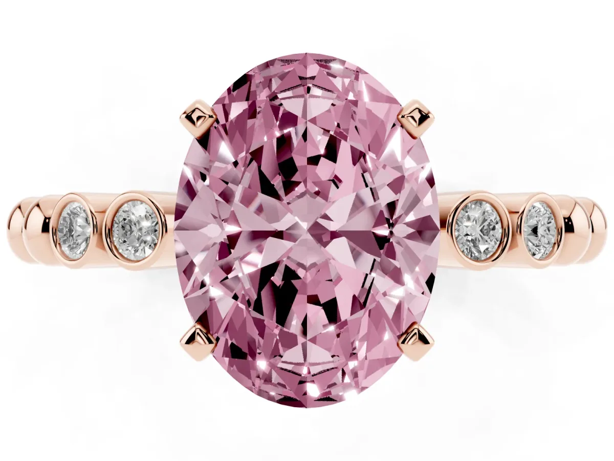 Fancy Pink Oval Cut Solitaire Bezel Accent Diamond Engagement Ring with Beaded Band and Four-Prong Setting Rose gold