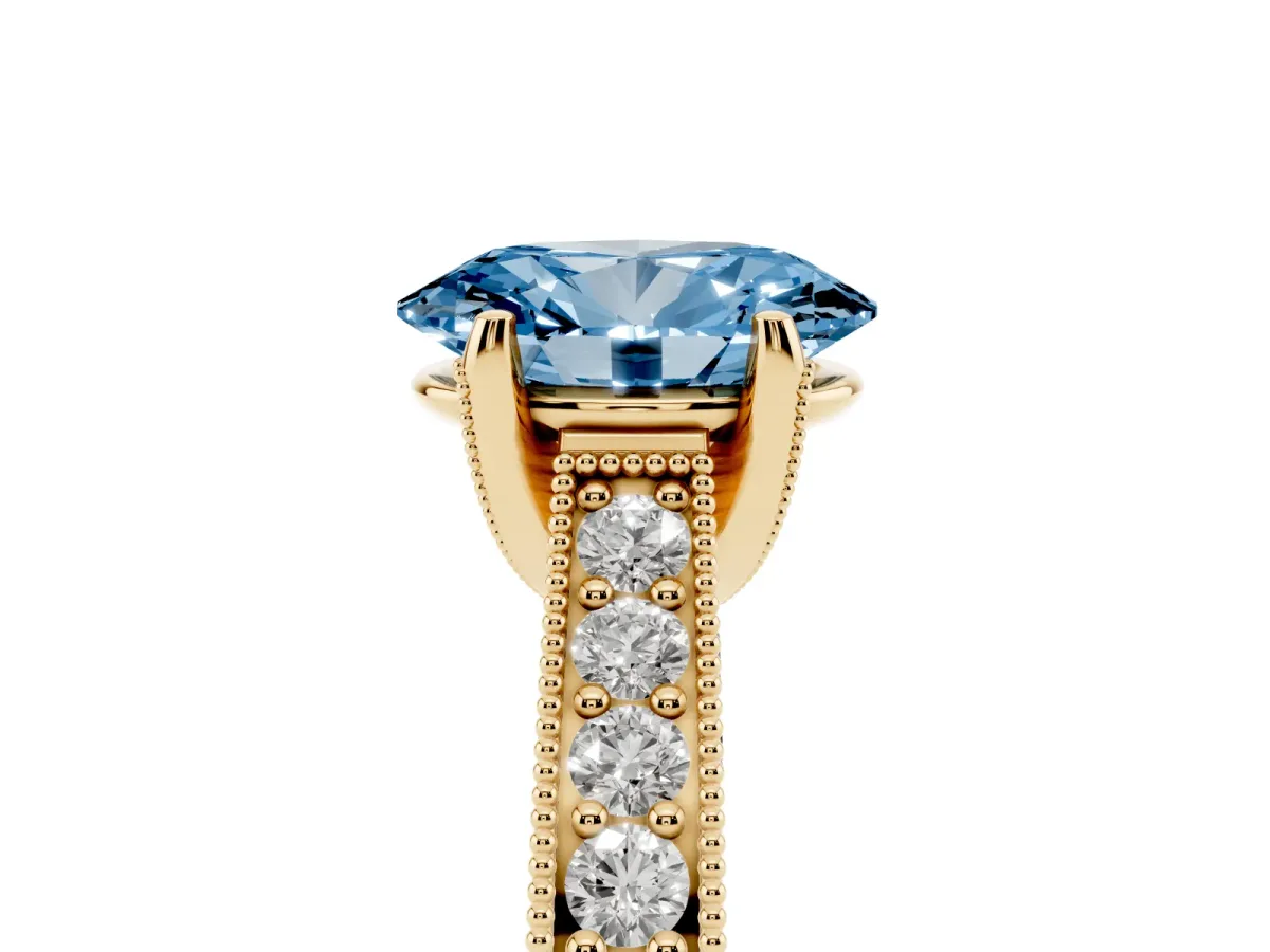 Fancy Blue Oval Cut Cut Diamond Solitaire Ring with Milgrain Pave Band and Four Prong Setting Yellow gold