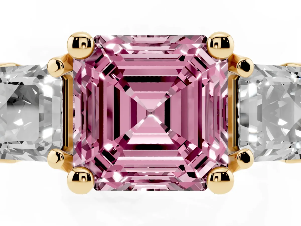 Fancy Pink Asscher Cut Diamond Three-Stone Ring with Channel Set Band and Four-Prong Setting Yellow gold