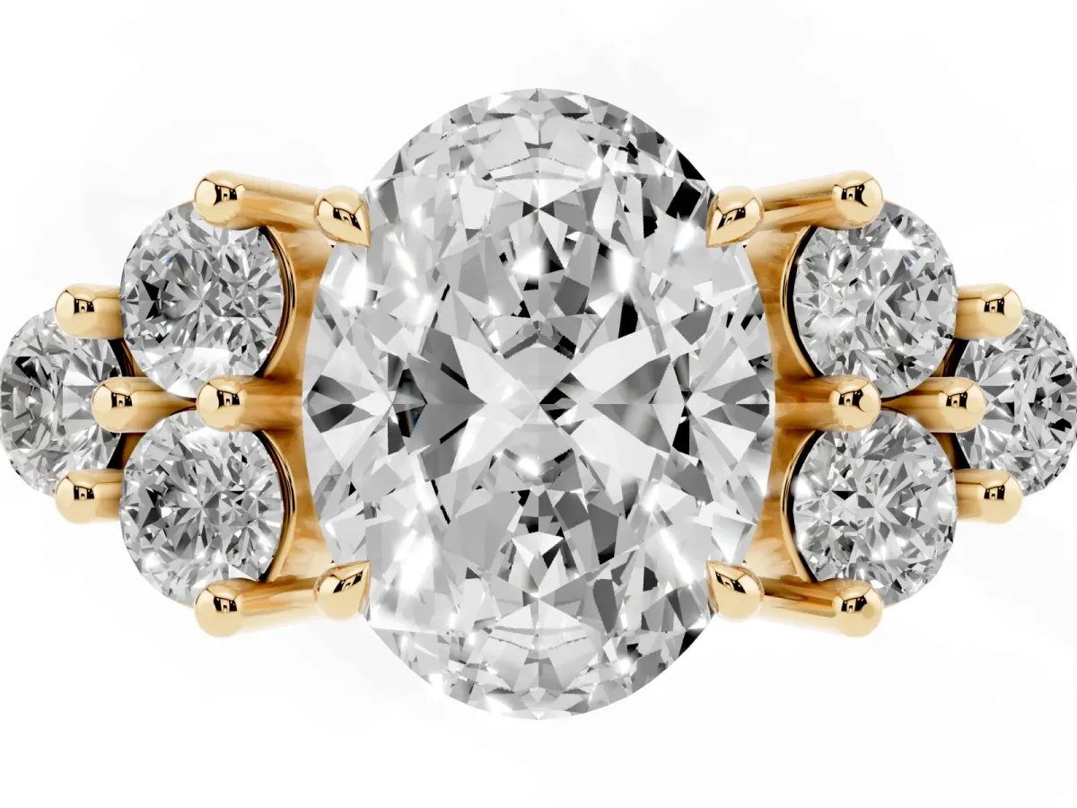 Oval Cut Brilliant Diamond Cluster Accent Solitaire Ring with Prong Setting Yellow gold
