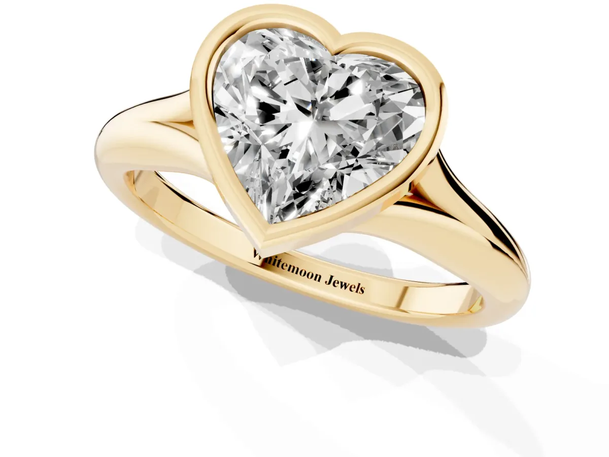 Bezel Set Heart Cut Solitaire Diamond Ring with Smooth Band Yellow gold