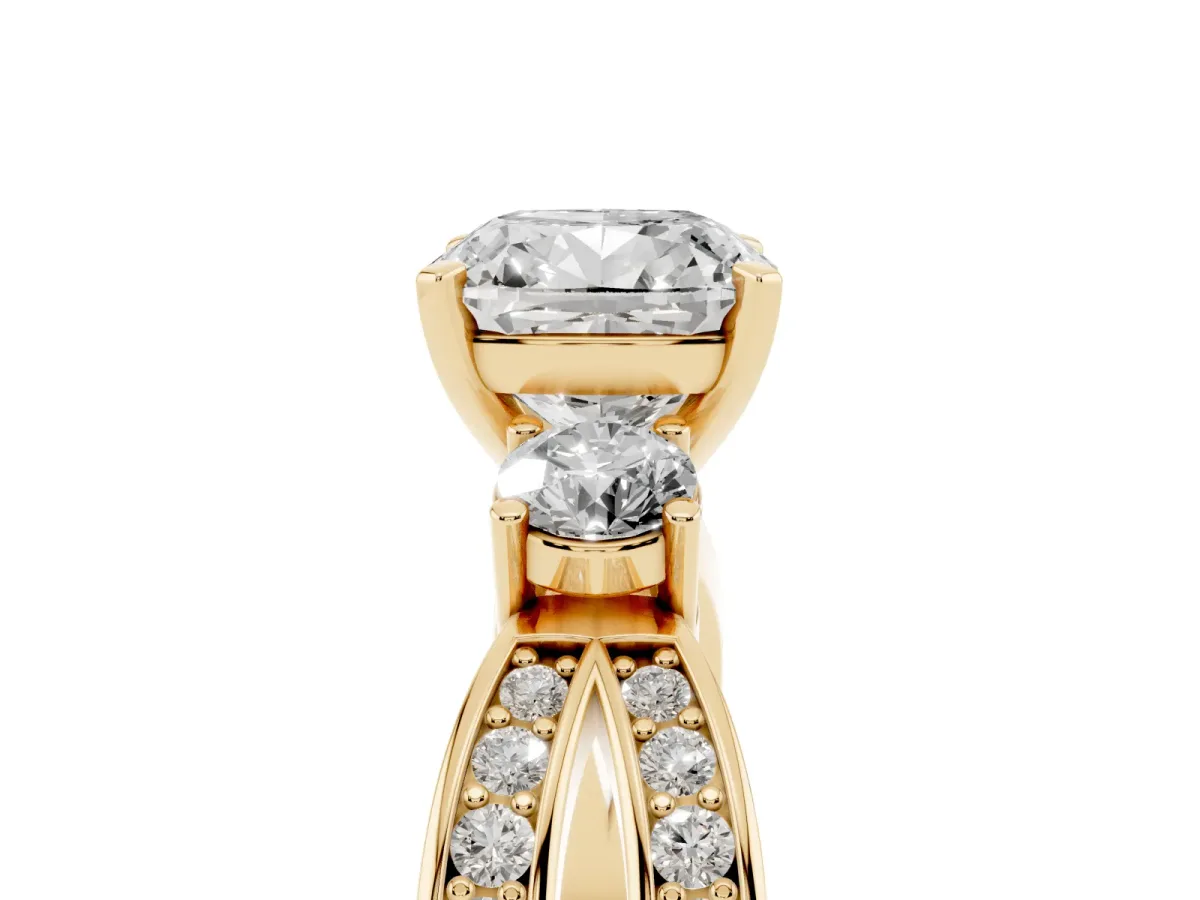 Three-Stone Cushion Cut Cut Diamond Twist Band with Prong Setting Yellow gold