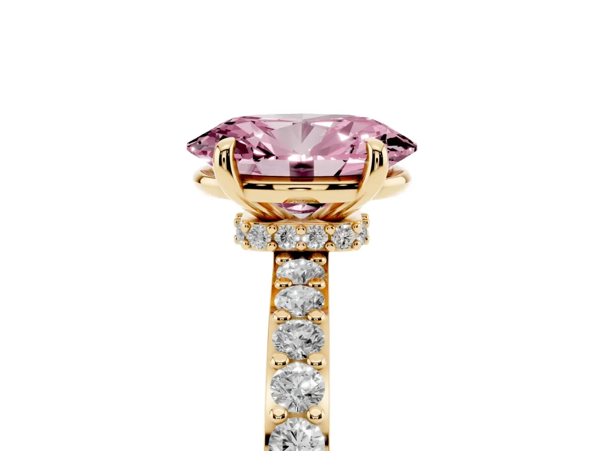 Fancy Pink Oval Cut Diamond Pavé Engagement Ring with Round Accents and Prong Setting Yellow gold