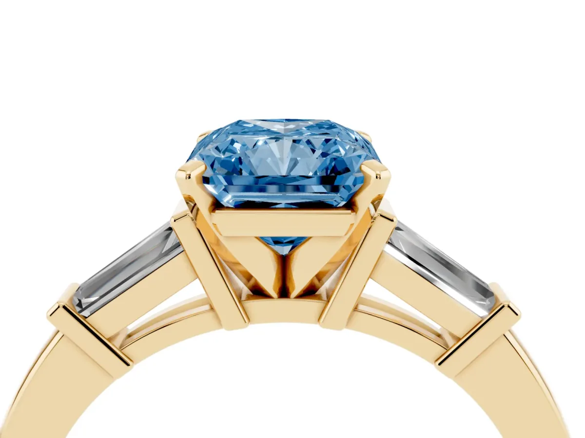 Fancy Blue Radiant Cut Cut Diamond Solitaire Ring with Tapered Baguette Accents and Four-Prong Setting Yellow gold