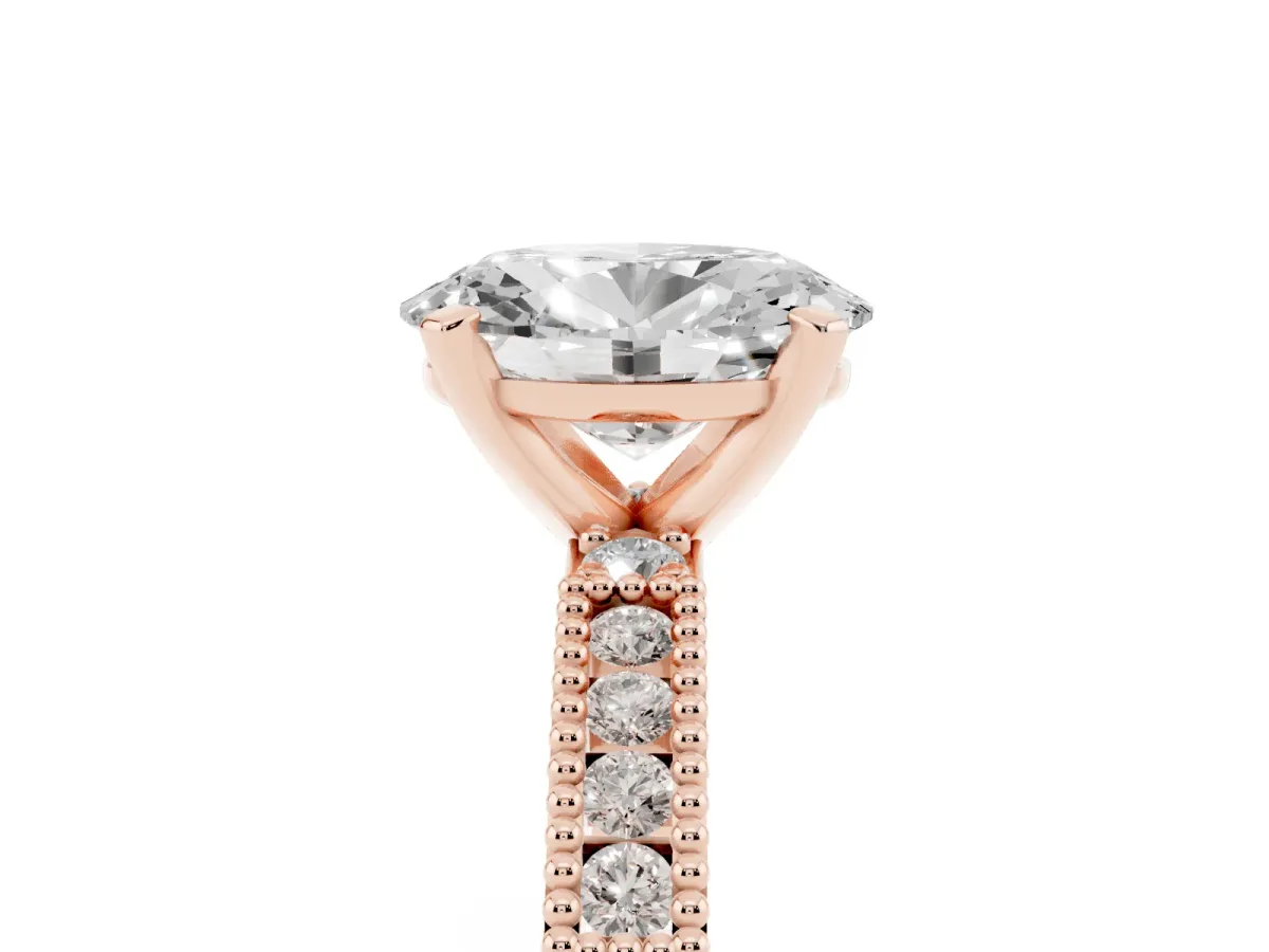 Oval Cut Solitaire with Pavé Band and Four-Prong Setting Rose gold